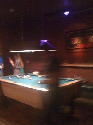 Ghost playing pool.