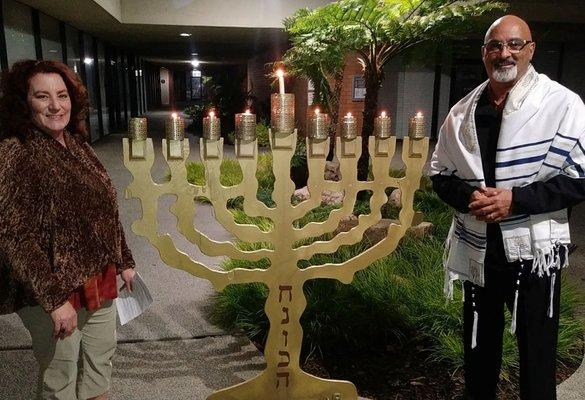 Lighting the chanukiah on the seventh night of Chanukah