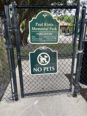 Front gate with park sign