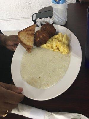 2 Salmon cakes, scrambled eggs & grits