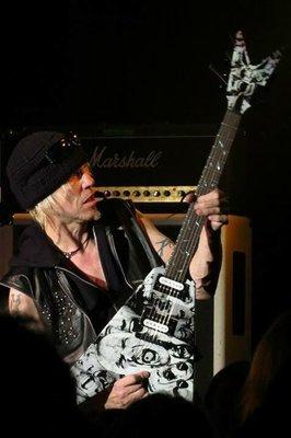 Michael Schenker - MSG in black leather vest custom made by Svanlund Design.