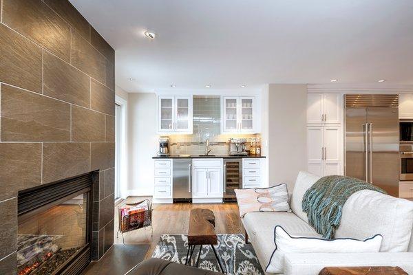 Renovated tile fireplace and added wet bar and cabinetry