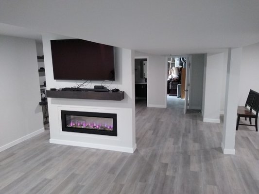 Finishing 1100 sq. foot basement complete with a Gas fireplace and Flat Screen TV