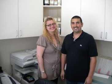 Dr. John and Angie Robles, our receptionist