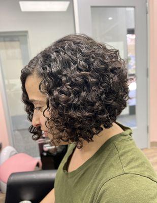 Curly angled bob