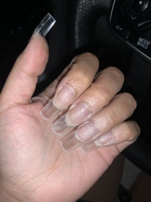 Unfinished nails and covered in nail glue