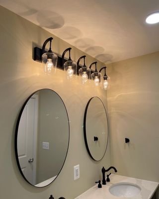 Vanity light and mirrors