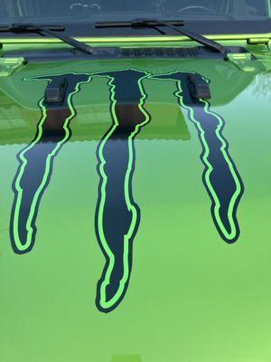 Logo on the Jeep JL Hood fitted to the windshield bumpers