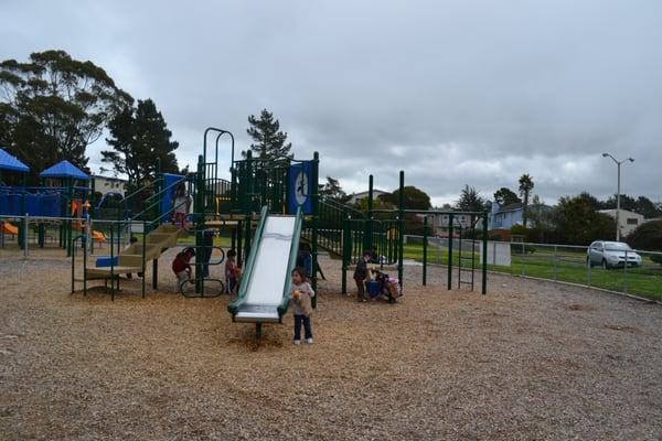 Fenced in playground for the kids