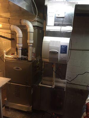 This is a carrier infinite Hights efficiency gas furnace with a humidifier and Hights efficiency media air filter