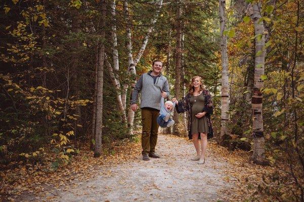 A photo of a family on the woods