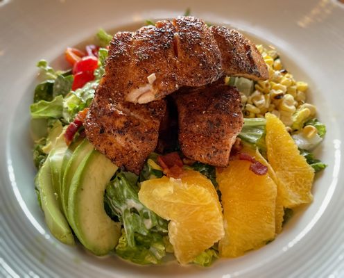 Tropical Salad special with blackened salmon.