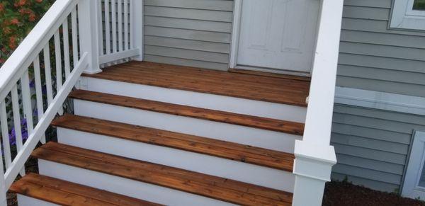 Repaint white railings and used a semitransparent stain for the steps.