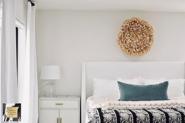 Bright & Airy Master Bedroom with a pop of color.