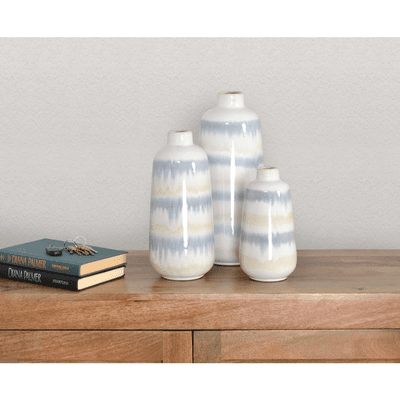 Gray Sand Artisan Porcelain Vase 3 PC Set. A stylish Gray Sand Vase Set of 3 offers three distinct Artistic Vases in varying heights widths.