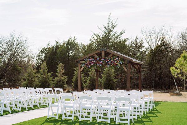 Meadows ceremony site with turf