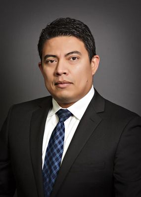 Carlos E. Sandoval, Attorney at Law