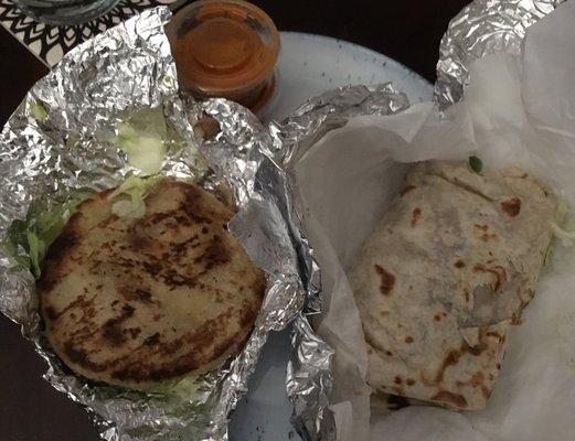 Gordita on the left with the red sauce. Green sauce was also an option. Guessing it might be more mild.