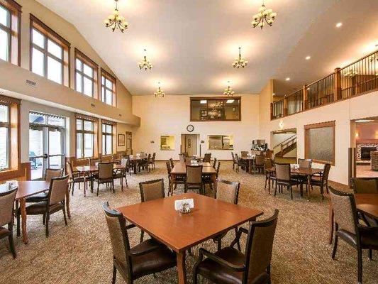 Formal dining room with a patio. Hot meal served each day at noon, 365 days a year and breakfast 5 days a week.