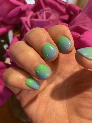 Ombré dip nails on nature nails.