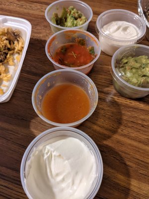 Guac, pico de gallo, hot sauce, sour cream