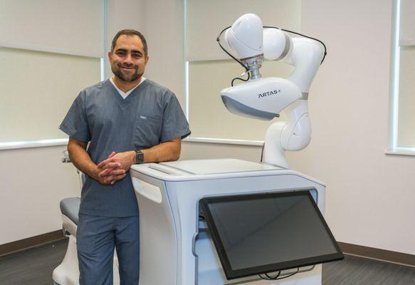 Dr. Kella with the ARTAS iX system