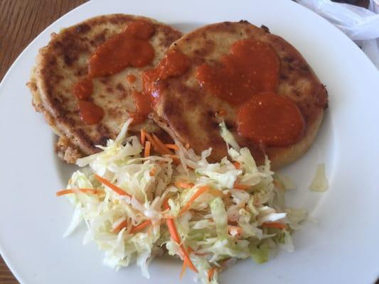 Two pork and cheese Pupusas.