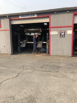 Roberto taking measurements before the final weld.