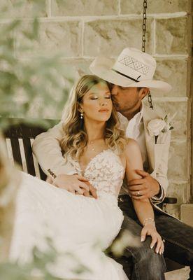 Relaxing on the front porch day of our wedding because our photographer makes everything a breeze.