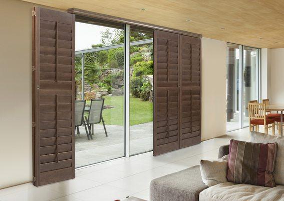 Norman Bi-Fold Shutters window treatment for patio doors!