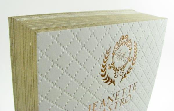 Custom WEDDING INVITATION with copper foil stamp on 400 LB cotton museum board paper with a gold painted edge.