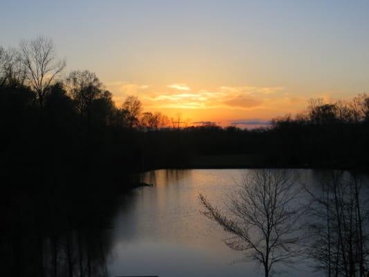 Enjoy sunsets from our screened in porch and relaxing Hot Tub!