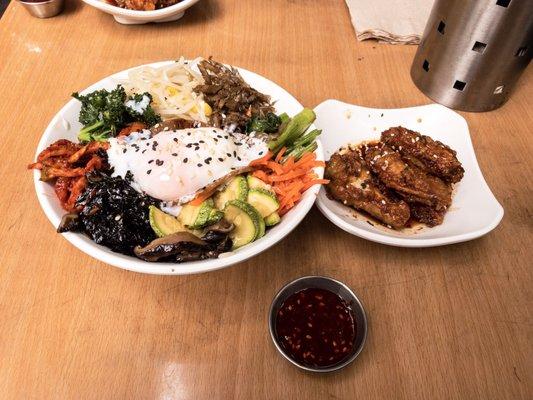 Small bimbimbap and spicy chicken. Adding egg is highly recommended.