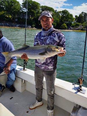 First Mate Vinnie Lao With Striper