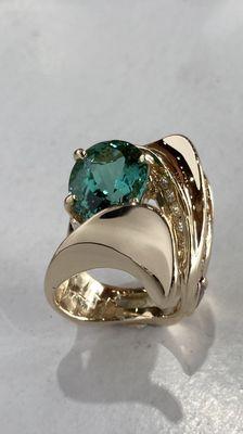 Tourmaline ring with diamond and sapphire accents