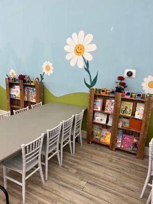 A cute book , coloring corner beside playground