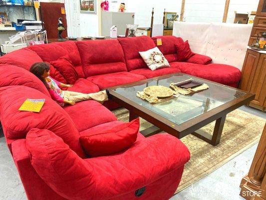 Red four piece sectional that comes with a sofa bed & two reclining chairs