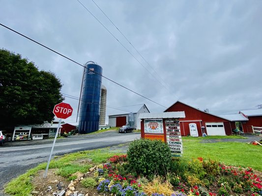 Produce stand to the left of the silo