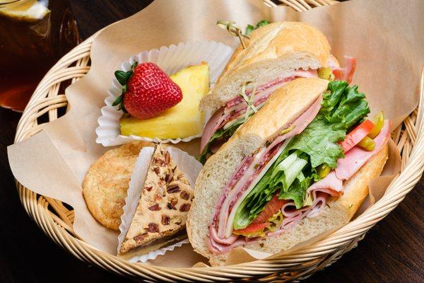 Italian Sub:
Ham OR turkey, salami, mortadella, provolone, pepperoncinis, lettuce, tomatoes & vinaigrette on a french roll.