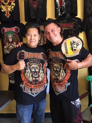 Coach Daniel with his KOTC Middleweight title and sponsor Ty Pham from Eliminate Clothing