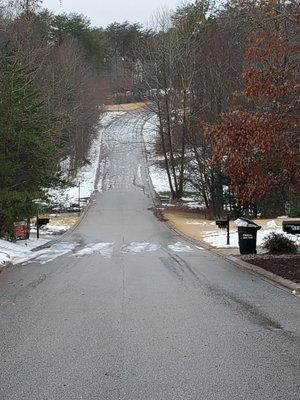 We spent the day watching cars make multiple attempts to climb this icy hill.