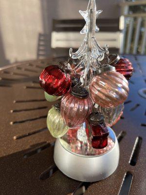 Patio table with 4 chairs on balcony at Grande Ocean with centerpiece moi mini tree beauty all glass   Sunday December 12, 2021