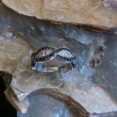 Check out this cool black and white diamond ring