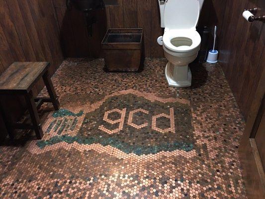 Copper penny logo floor