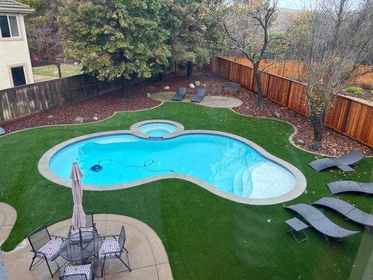 Our finished pool in the backyard from our primary bedroom window on the second floor.