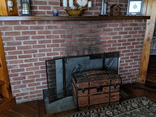 Insulation (during the summer) still inserted in the fireplace.