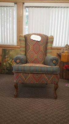 Custom reupholsteres wing back chair for a client.