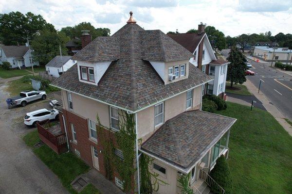 Owens Corning Duration Aged Copper Shingle with a restored copper cupola.