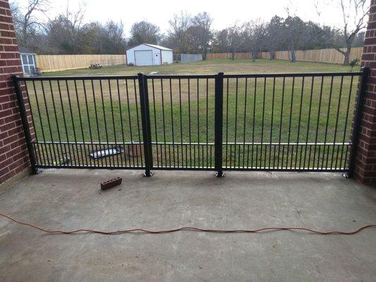 Fencing and gate with puppy pickets for client in Manvel,TX