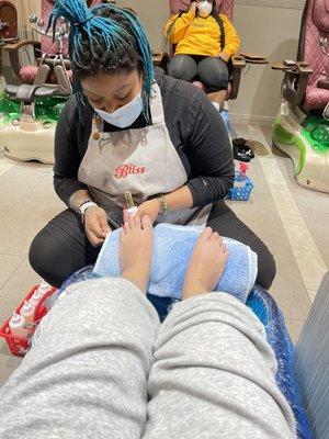 She has no idea what she's doing! it's a basic white gel manicure, why do I have cuts on my toes?! Along with polish on my skin!